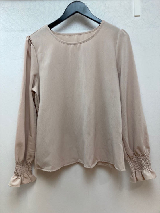 Billede af Ny beige bluse